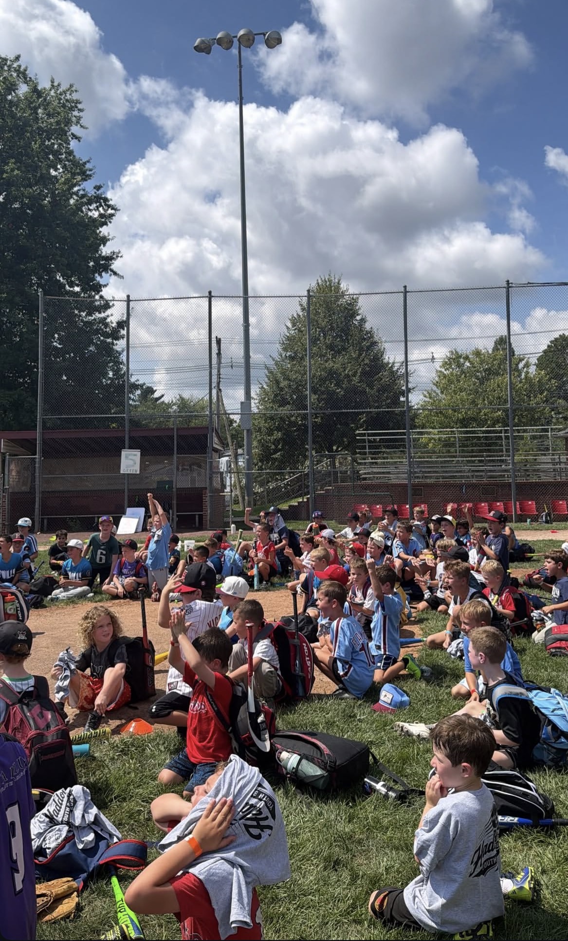 WIN campers gathered on the field for a team talk