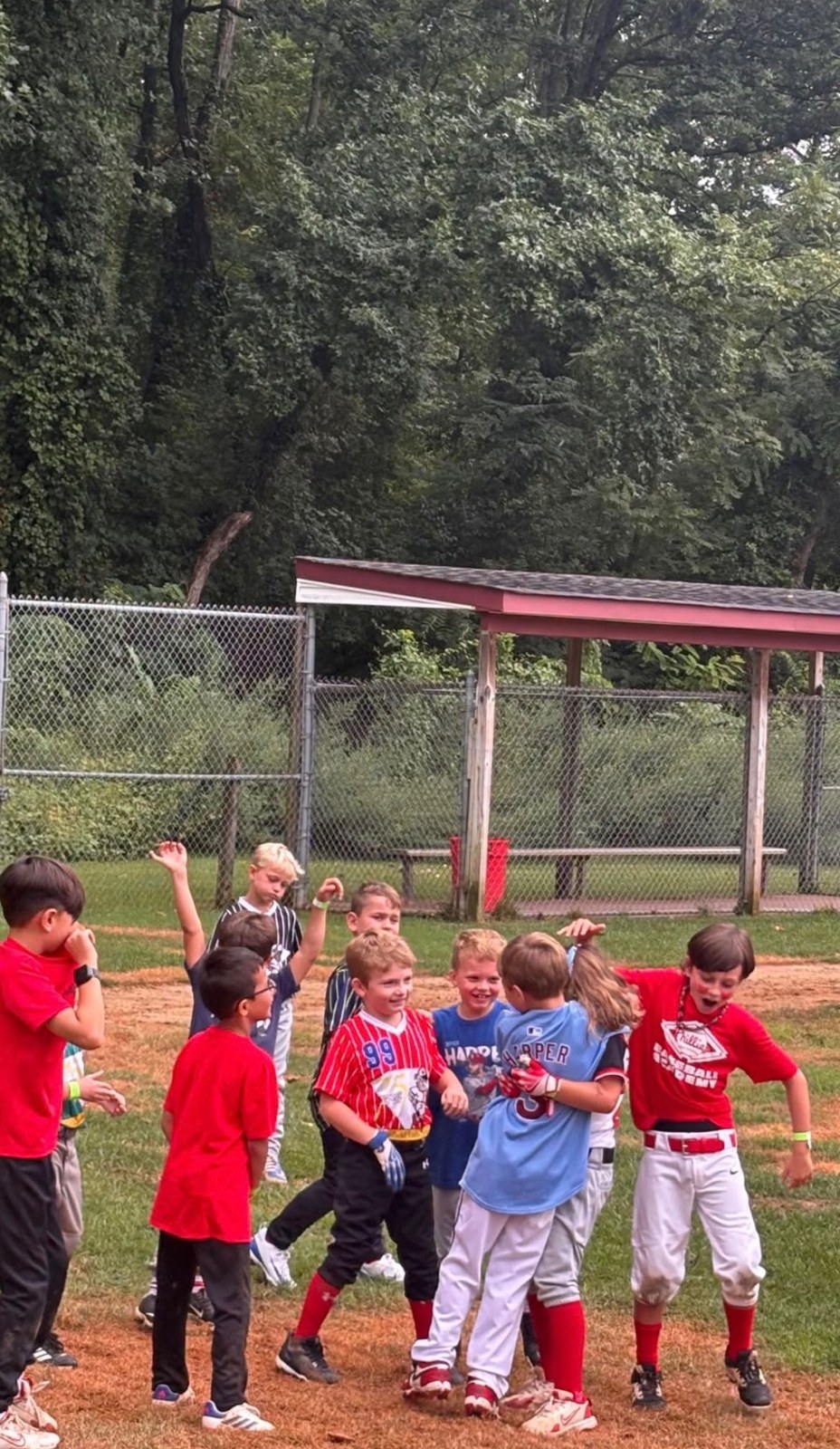 Campers celebrating together after a game